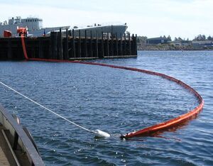 Inshore containment boom on water